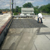 Reader Roofing working on a commercial roof repair.