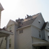 Reader Roofing crew install new roof on East Cleveland home.